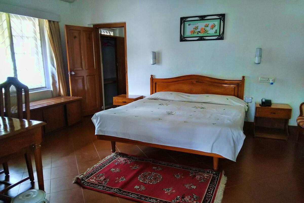 Casa de campo estándar, vistas al jardín | Cunas (de pago) y camas supletorias