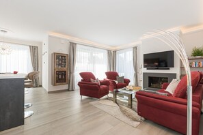 Fernseher, Kamin