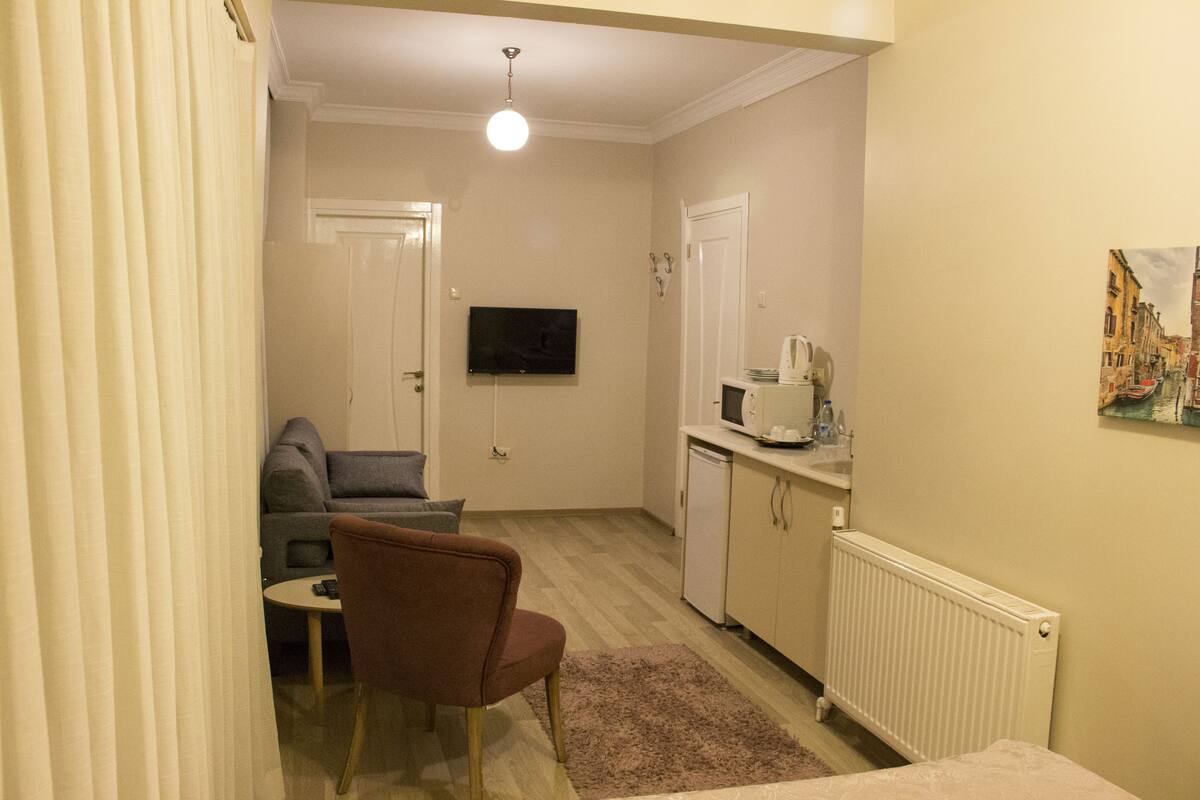 Standaard studio, 1 queensize bed | 1 slaapkamer, donsdekens, bedden met traagschuimmatrassen