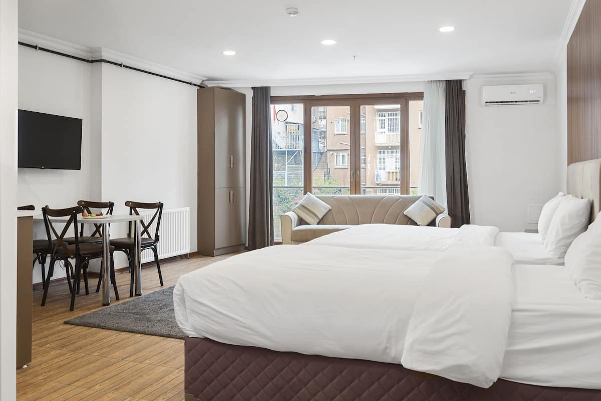 Family Studio, City View | 1 bedroom, in-room safe, desk, soundproofing