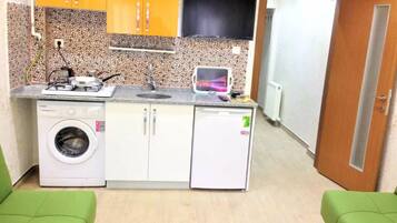 Appartement, 2 chambres | Coin cuisine privé | Réfrigérateur, plaque de cuisson