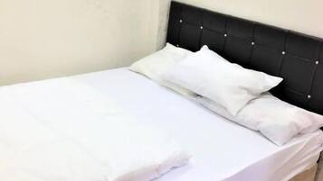 Appartement, 2 chambres | Coffres-forts dans les chambres, rideaux occultants