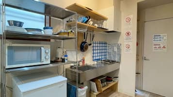 Fridge, microwave, stovetop, cookware/dishes/utensils