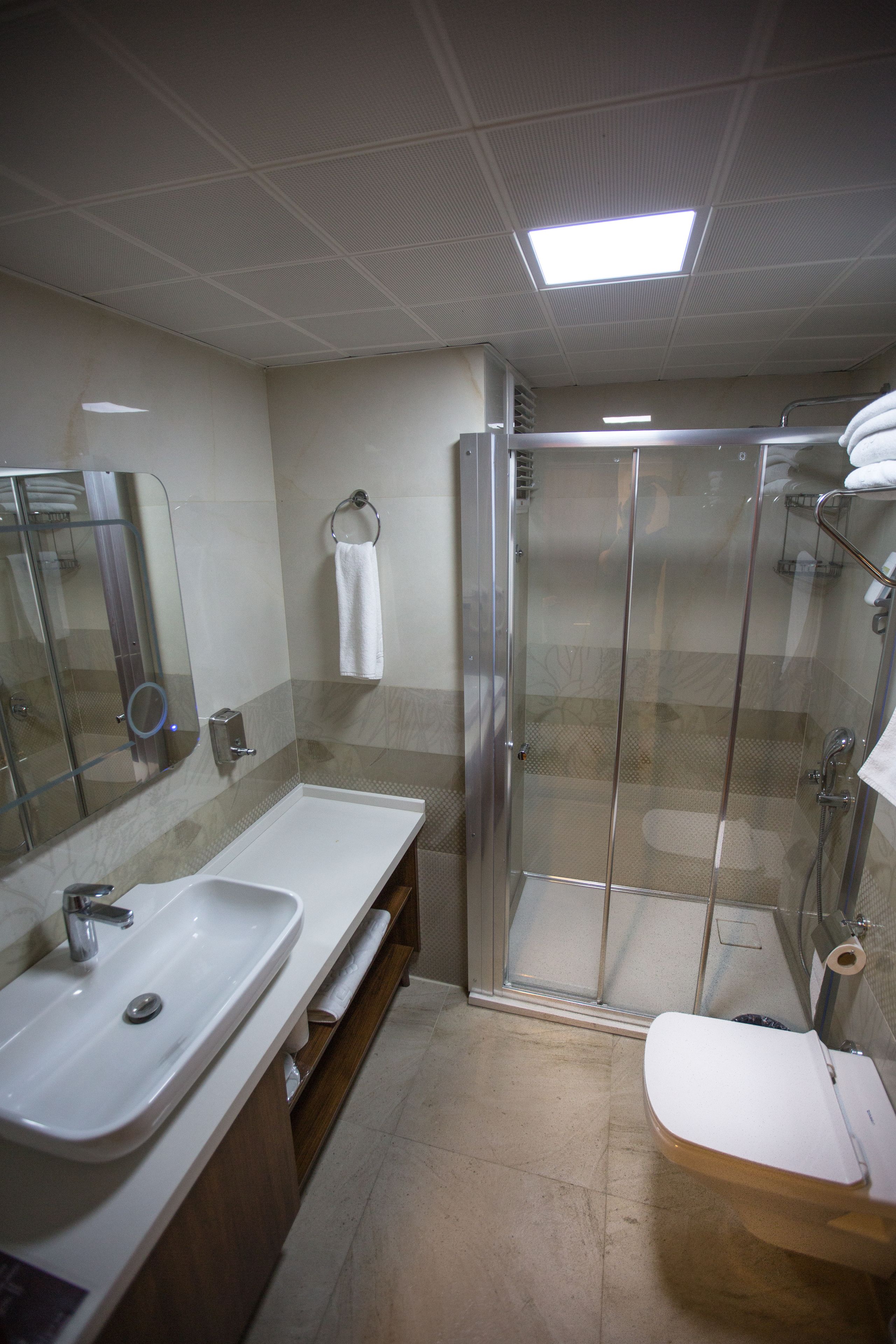 family triple room, city view | premium bedding, free minibar items, in-room safe, desk