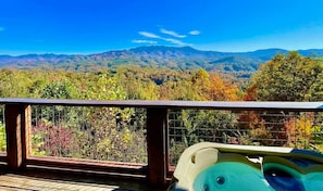 A balcony with a view of a mountainous landscape. - Gigantic Views GSMNP/3.6 Miles 2 DwTn Gatlinburg (Gatlinburg)