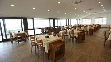 Breakfast, lunch, dinner served; sea views