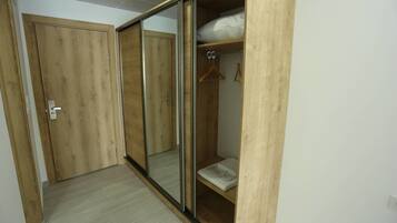 Hypo-allergenic bedding, laptop workspace, blackout curtains