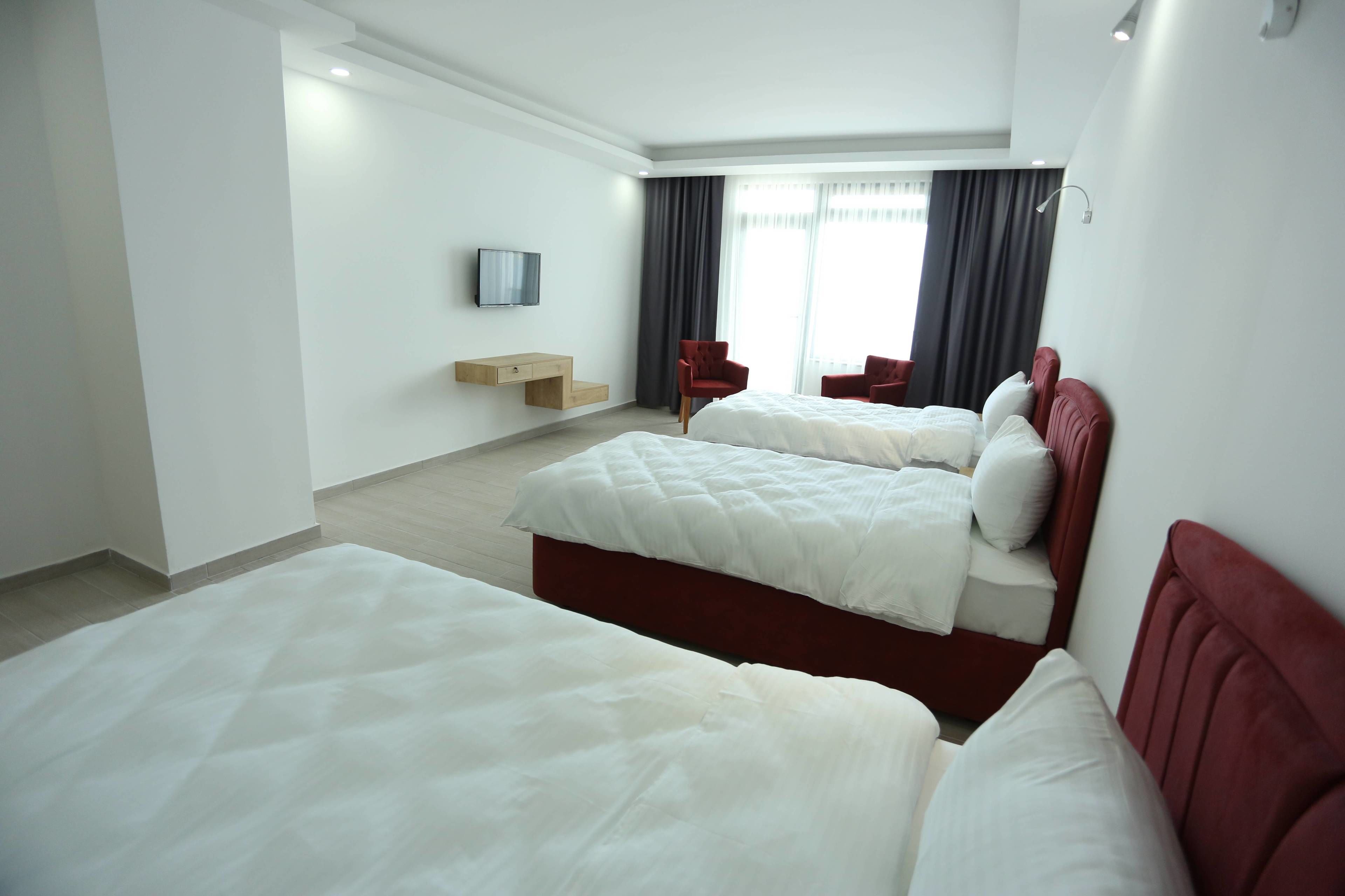 triple room, sea view | hypo-allergenic bedding, laptop workspace, blackout curtains