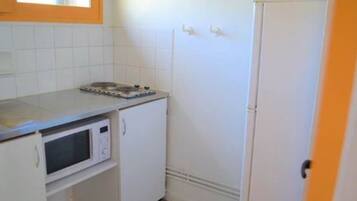 Fridge, microwave, cookware/dishes/utensils