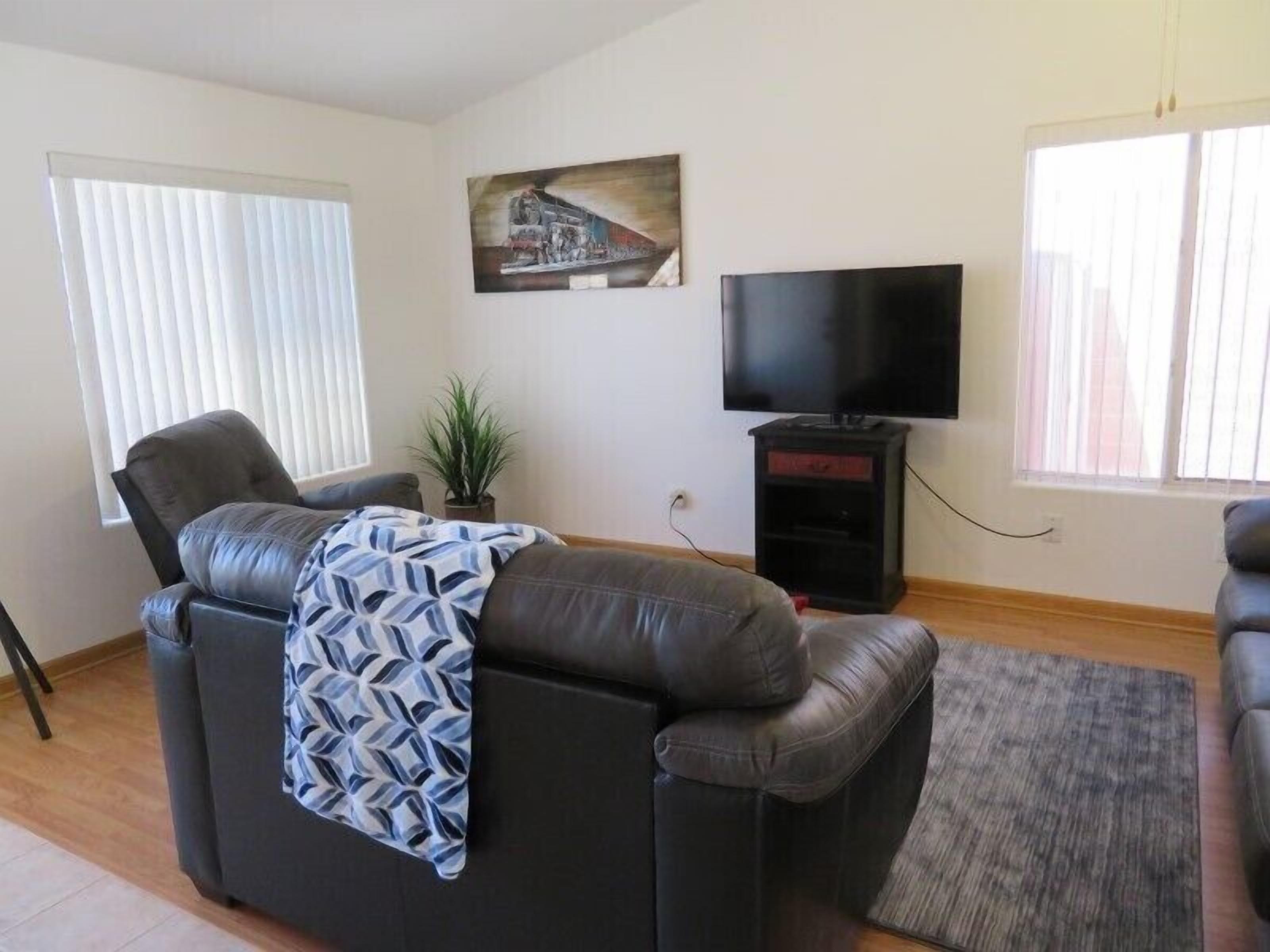 Wildfang Retreat by Mesquite Vacation Rentals with substantial backyard & off street parking!