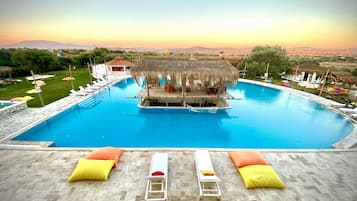Seasonal outdoor pool, pool umbrellas, pool loungers