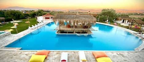 Seasonal outdoor pool, pool umbrellas, pool loungers