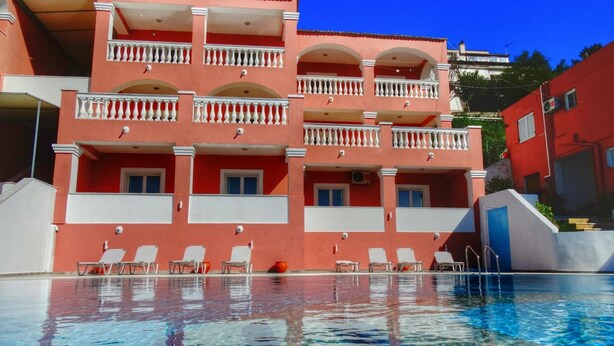A multi-story hotel with a pool in front. - Paradiso Aparthotel (Corfu)