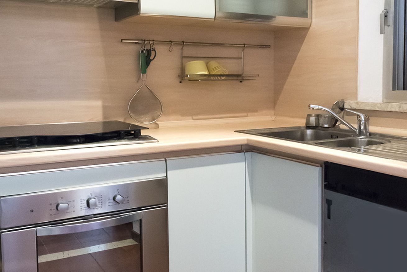 Een koelkast, een oven, een vaatwasser, een vriezer