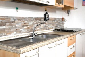 Fridge, freezer, dining tables