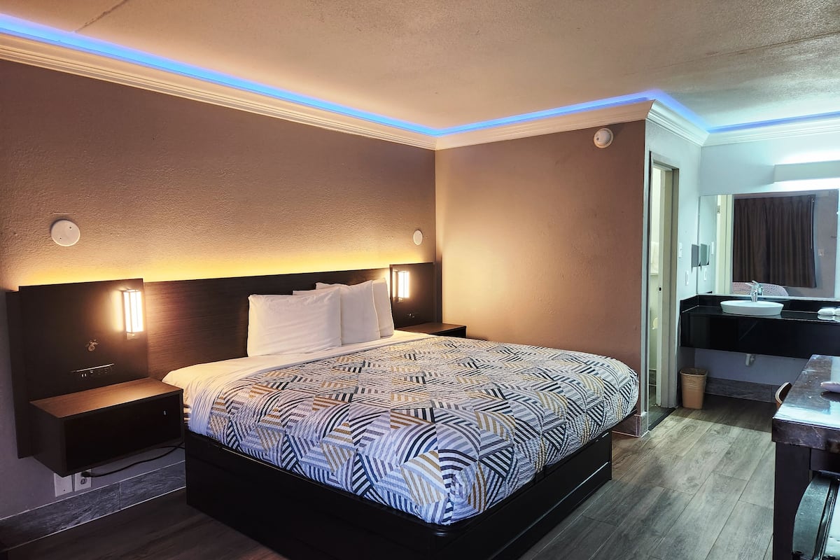 Premium bedding, desk, blackout drapes, iron/ironing board