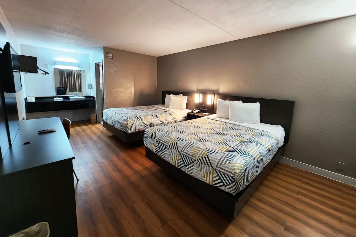 Premium bedding, desk, blackout drapes, iron/ironing board