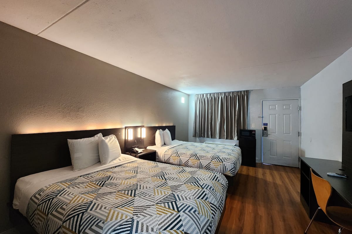 Premium bedding, desk, blackout drapes, iron/ironing board