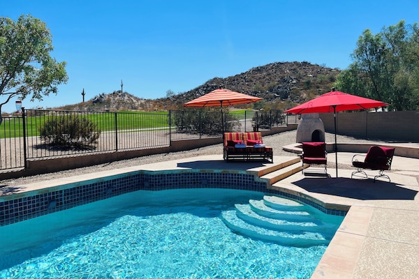 Backyard oasis with south west views of the 10th hole and mountains.
