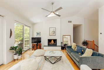 Living room with hallway leading to 3 bedrooms and 2 bathrooms. 