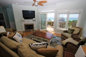 Flat-screen TV, fireplace, video games, DVD player