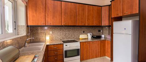 Apartment | Private kitchen | Fridge, oven, stovetop, dishwasher