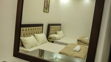 Signature Quadruple Room | Egyptian cotton sheets, premium bedding, down comforters