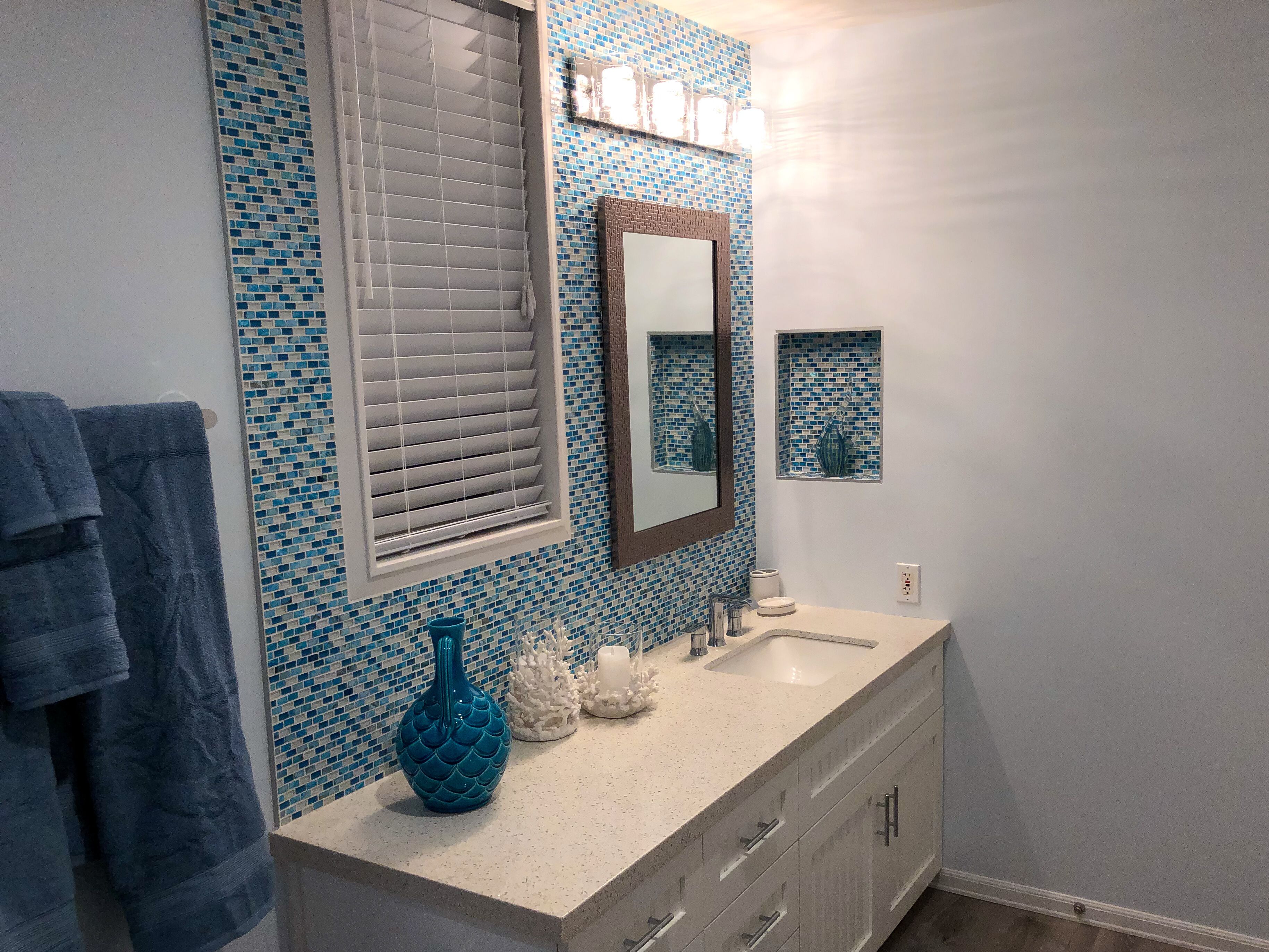 Combined shower/tub, hair dryer, towels, soap