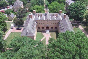 Stunning historic building with a central courtyard surrounded by lush greenery.