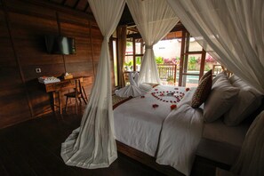 Deluxe Room, Garden View | Minibar, in-room safe, individually decorated, individually furnished - Villa D'Uma (Ubud)