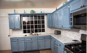 Fridge, microwave, oven, stovetop - Treasure Beach Inn Room One w/ Private Bathroom (St. Elizabeth Parish)