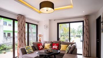 Executive Bungalow, Kitchen, Pool View | Living area | 20-inch flat-screen TV with cable channels, TV
