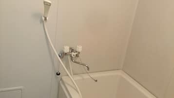 Classic Apartment, Multiple Beds, City View | Bathroom | Slippers, towels