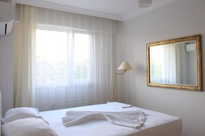 Family Apartment, Garden View | 1 bedroom, soundproofing, iron/ironing board - Rumeli Apart Otel (Gökçeada)