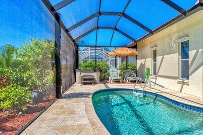 Villa on golf course with heated saltwater pool.