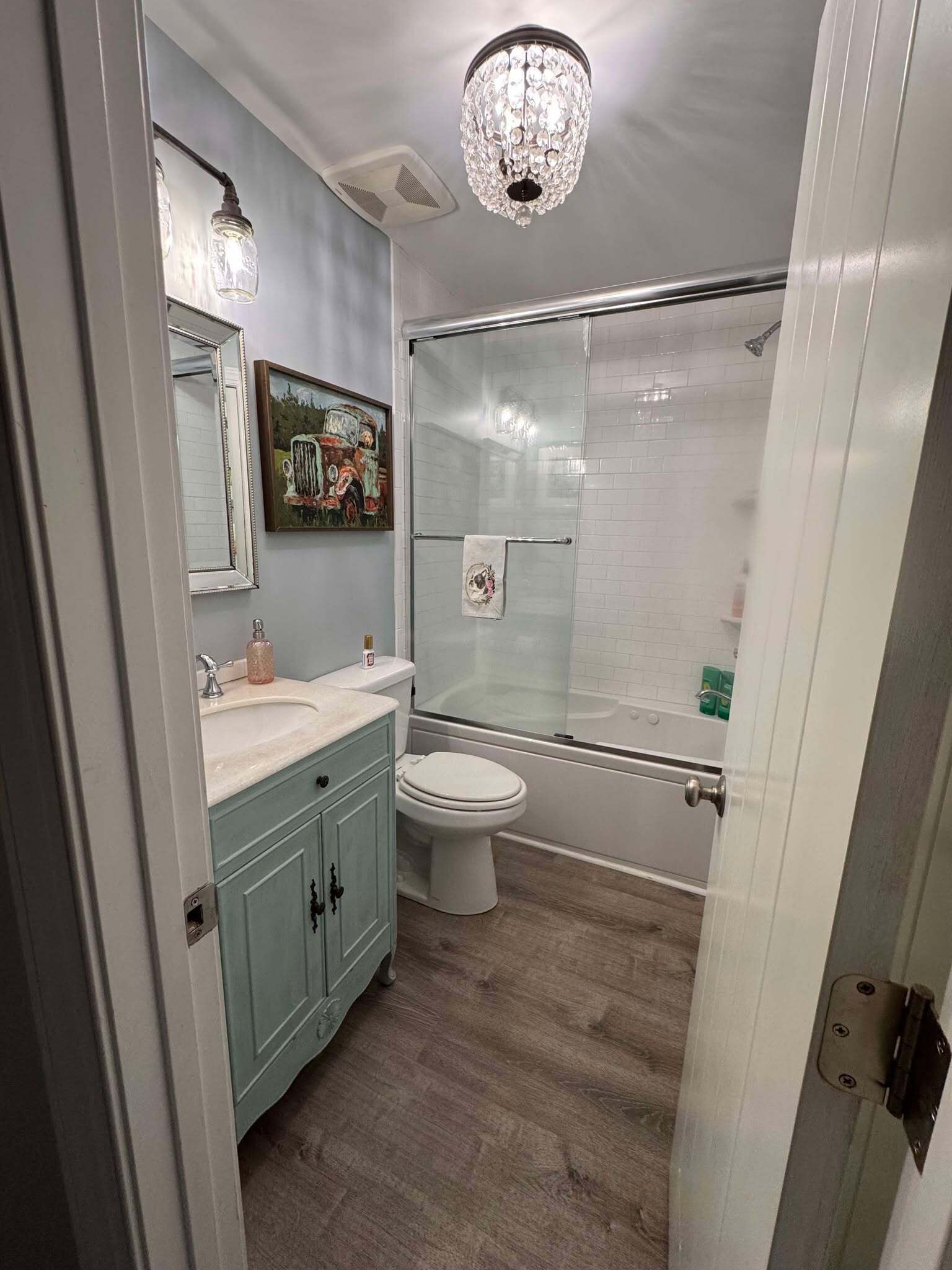 Combined shower/tub, hair dryer, towels, soap