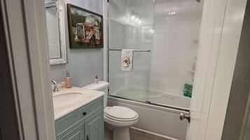 Combined shower/tub, hair dryer, towels, soap