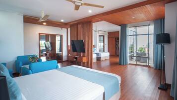 Family Studio Suite, Balcony, Partial Sea View | 1 bedroom, down duvets, in-room safe, desk
