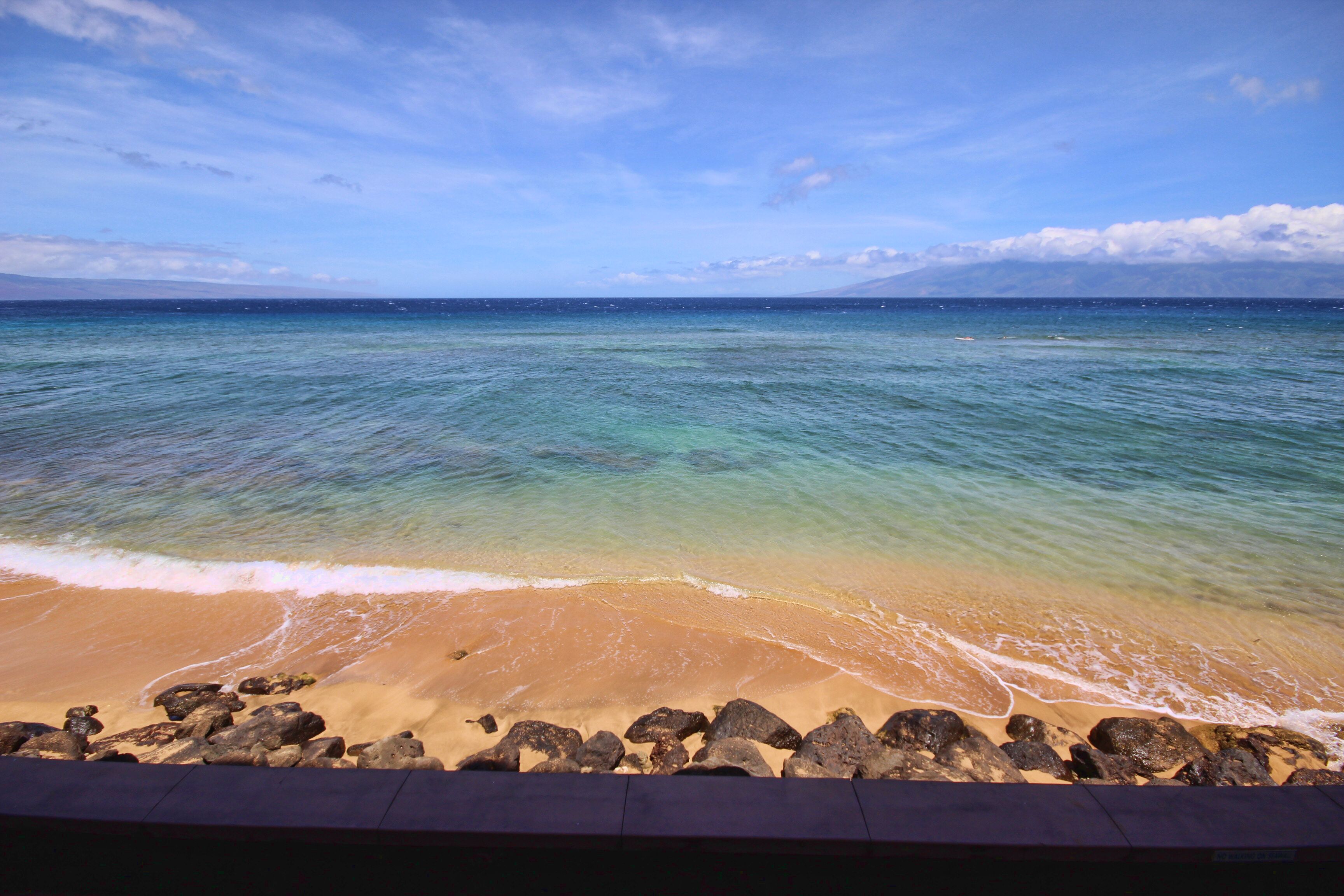 On the beach, sun loungers, beach towels