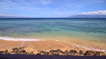 On the beach, sun loungers, beach towels