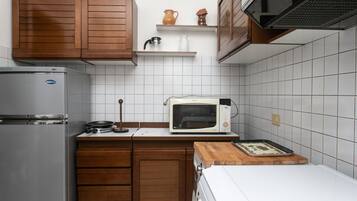 Fridge, oven, dining tables