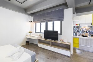 디럭스 스튜디오 | 이집트산 면 시트, 고급 침구, 미니바, 책상