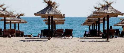 On the beach, white sand