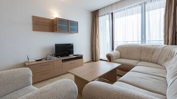 Panoramic Apartment, 2 Bedrooms, Balcony, Sea View | Living area | 30-inch flat-screen TV with satellite channels