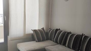 Apartment, 1 Bedroom, Sea View | 1 bedroom, soundproofing, iron/ironing board, free WiFi
