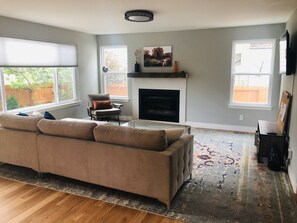 Smart TV, fireplace, DVD player, books