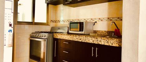 Microwave, coffee/tea maker, cookware/dishes/utensils