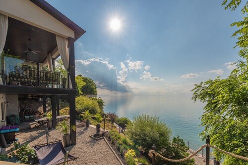 LUXURY LAKEFRONT HOME WITH PRIVATE BACKYARD BEACH & SPECTACULAR VIEW