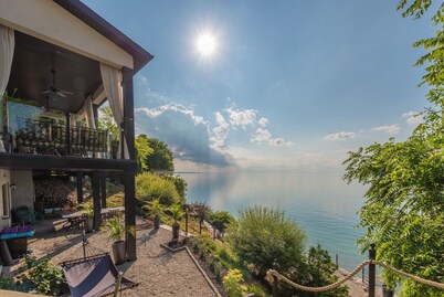 LUXURY LAKEFRONT HOME WITH PRIVATE BACKYARD BEACH