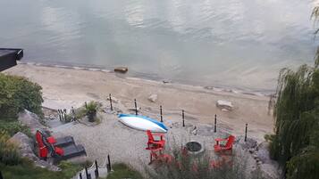 On the beach, sun loungers, beach towels